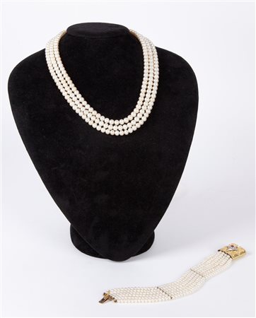  
Demiparure di bracciale e collana in perle, oro con rubini e brillanti 
 collana cm 46 - bracciale cm 20
