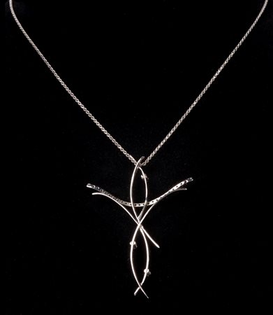  
Croce in oro bianco e brillanti 
 cm 6,5x4,5