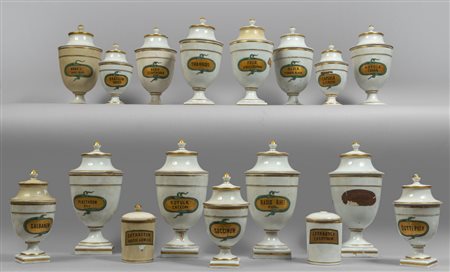 Serie di vasi da farmacia in porcellana con 