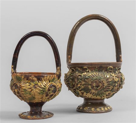 Due scaldini in terracotta smaltata, 