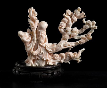 SCULTURA IN CORALLO ROSA CON SHOULAO