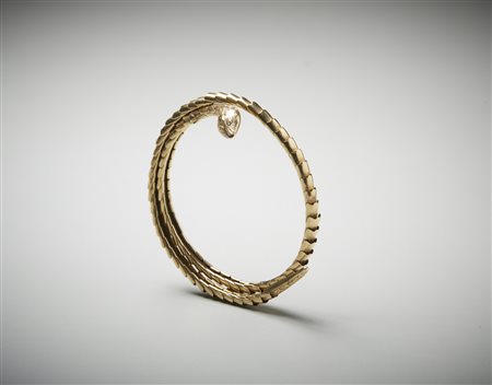  . - Bracciale alla schiava con serpente in oro 9k. .