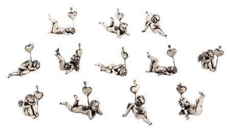 12 segnaposto in argento a forma di puttini