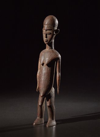  Arte africana - Burkina Faso - Lobi.
Figura maschile o Bateba.
Legno duro a patina naturale.
Segni d'uso.