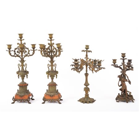 QUATTRO CANDELABRI in metallo