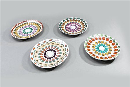 PIERO FORNASETTI<BR>Milano 1913 - 1988<BR>Quattro piatti della serie Giostre di frutta