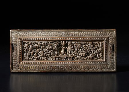 Arte Himalayana - Copertina di libro in legno intagliato 
Tibet, XVII secolo .