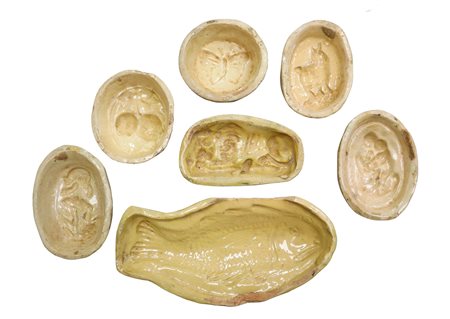 Gruppo di 7 formelle per mostarda