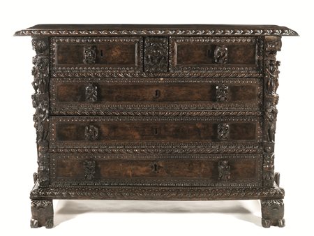Importante cassettone a bambocci, prima metà sec. XVII, in noce scolpito a...