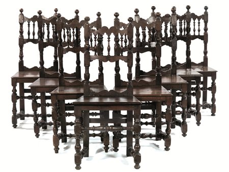 Otto sedie, Siena, inizi sec. XVIII, in noce intagliato a patina scura,...