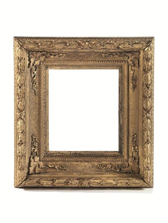 Due cornici, sec. XVIII, in legno intagliato e dorato, una a cassetta con...