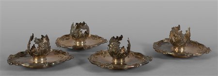 Quattro trombleuses Luigi XV in argento sbalzato, 