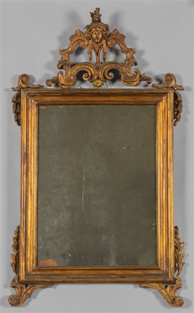 Specchiera in legno intagliato e dorato 