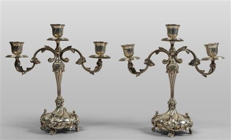 Coppia di candelieri a tre luci in 