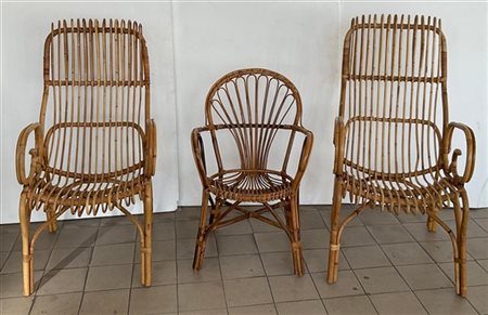 Lotto composto da una coppia di poltrone ed una poltroncina in vimini. Italia,