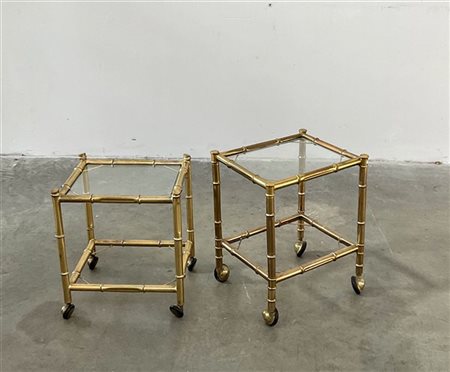 Due carrellini con struttura in metallo dorato a finto bamboo, ripiani in crist