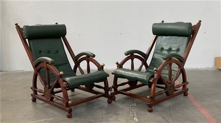 Coppia di poltrone con braccioli a guisa di timone, recanti targhe con iscrizio