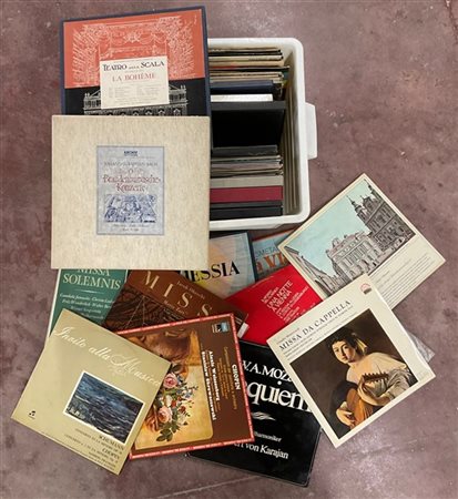 Cassetta contenente numerosi dischi (difetti)