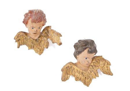 Pair of sculptures "HEADS OF ANGELS"