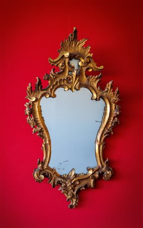 Specchiera a ventola in legno intagliato e dorato