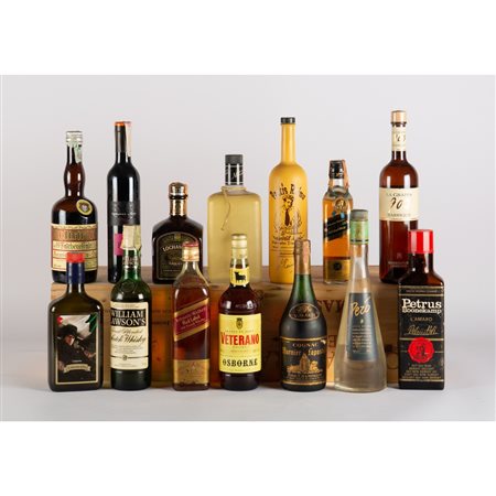 QUATTORDICI BOTTIGLIE varie di distillati