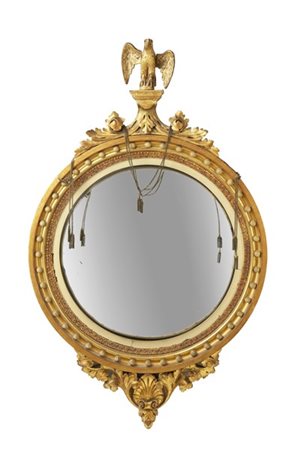 Specchiera in legno intagliato e dorato con cornice circolare bordata da perlin