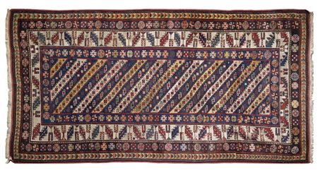 Tappeto Gandjiè, Caucaso, fine secolo XIX. Decoro a losanghe diagonali a fondo