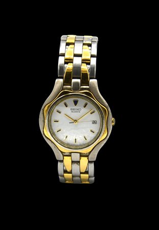 SEIKO QUADRANTE: bianco con indici blu, lancette dorate e datario CINTURINO:...