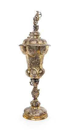  
Grande coppa con coperchio in argento fuso, sbalzato e cesellato, bolli austro ungarici  
 altezza cm 67 - gr. 2288