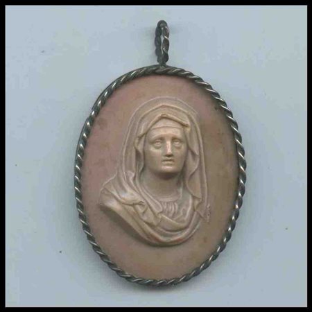 

Bassorilievo ovale con santa