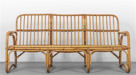 UN DIVANO, anni '60. <br>Malacca, giunco e canna 
