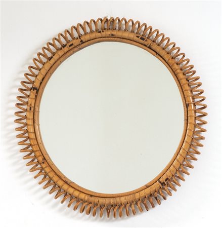 UNO SPECCHIO DA PARETE, anni '60. <br>Malacca, 