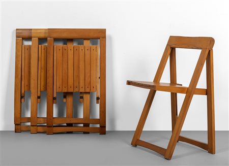  QUATTRO SEDIE PIEGHEVOLI, anni '60. <br>Legno di 