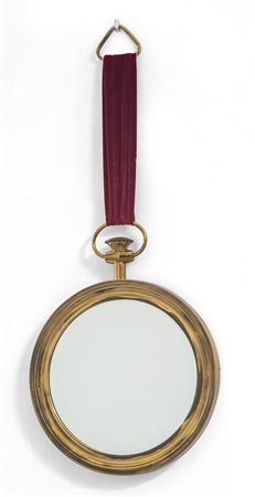 UNO SPECCHIO DA PARETE, anni '60. <br>Ottone, 