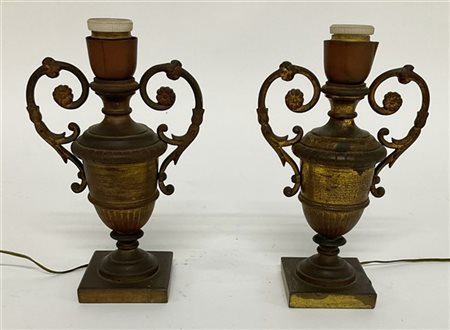 Due portapalme in bronzo montate a luce elettrica