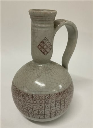 Manifattura di Vietri 
Vaso con ansa in ceramica. (h cm 31)