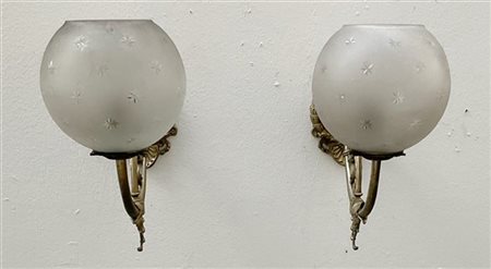 Lotto composto da quattro applique in metallo (difetti, rotture e mancanze))