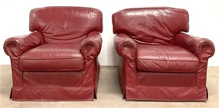 Coppia di poltrone imbottite rivestite in ecopelle rossa (difetti).
Evento ETRO