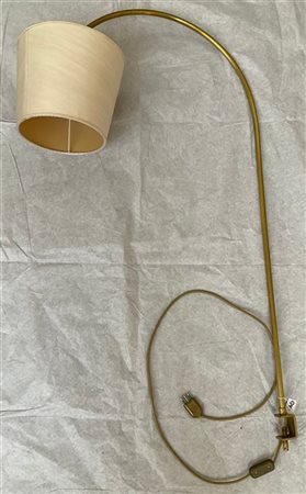 Parte di lampada a morsetto con fusto in ottone, paralume in tessuto. Secolo XX
