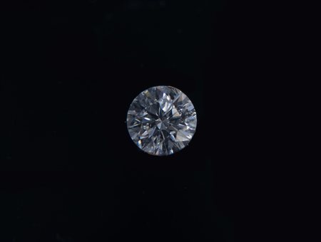 DIAMANTE SCIOLTO Taglio brillante rotondo, di ct 0,73. Accompagnato di...