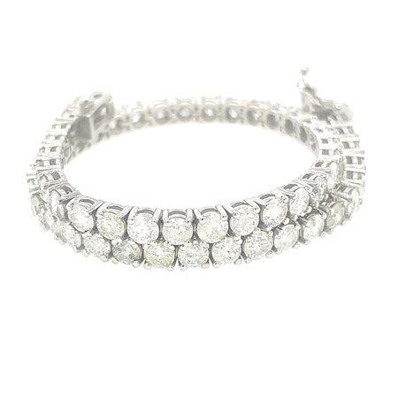 BRACCIALETTO IN ORO BIANCO 14K 9.63 GR CON DIAMANTI PER 7.02 CT COLORE...
