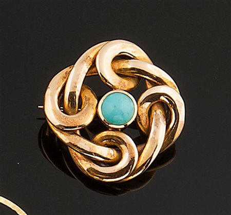 MUSY Spilla in oro giallo ad intreccio, firmata "Musy", con al centro...