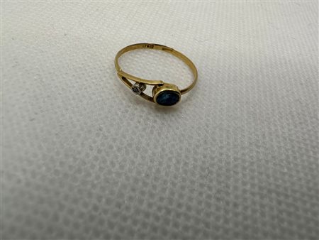 ANELLO CON PIETRA BLU SCURO (ZAFFIRO) E BRILLANTINO MIUSURA 14 GRAMMI 0,9 - AU20