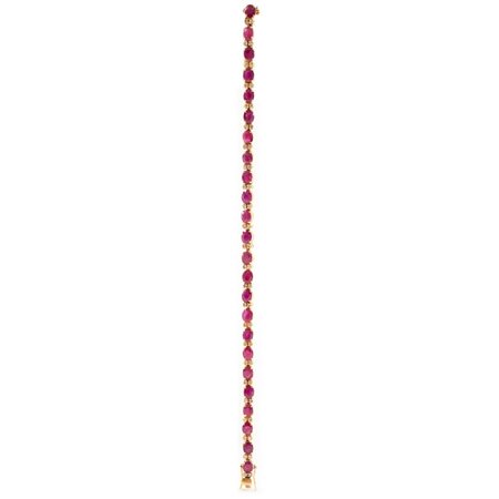 BRACCIALE in oro giallo 18 KT con brillanti e rubini