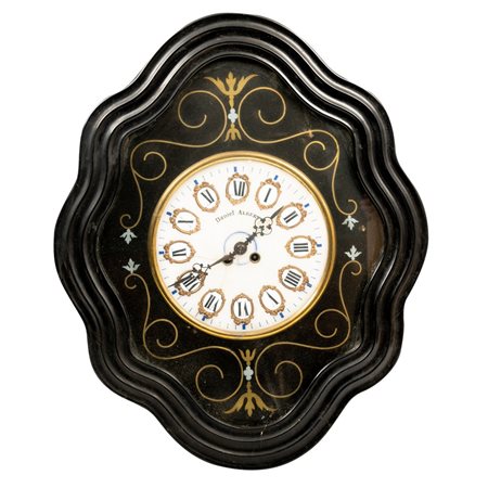 Orologio occhio di bue in legno ebanizzato con tarsie