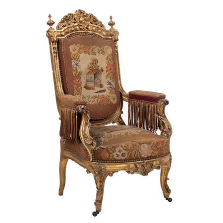 MANIFATTURA FRANCESE DEL XIX SECOLO,Poltrona in legno dorato