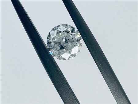 DIAMANTE 0,7 CT COLORE G - PUREZZA I1 - TAGLIO BRILLANTE - INCISO AL LASER +...