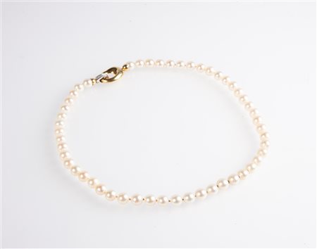  
Collana di perle, oro e brillanti 
 Lunghezza cm 48