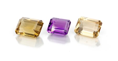  
Due citrini e ametista taglio a gradini 
 