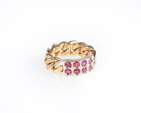  
Pomellato - anello a maglia groumette in oro e rubini 
 Misura 13